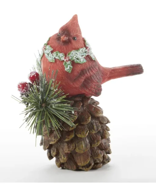 Décor de table, cardinal sur pomme de pin