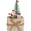 Décor de table, Père Noël, avec des cadeaux montés sur une section d’arbre.
