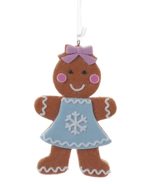 Décoration, fille en pain d'épices, avec une robe à motif de flocon de neige.