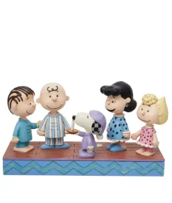 La bande de Peanuts en pyjama de Noël