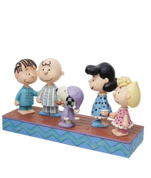 La bande de Peanuts en pyjama de Noël
