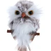 Ornement, petit hibou brun et blanc, sur une branche