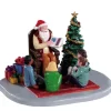 Par Lemax, le Père Noël raconte des histoires.