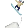 Par Lemax, le snowboarder prend de l'air.