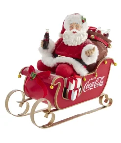Pièce de table Coca-Cola® Père Noël dans un traîneau