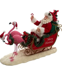 Père Noël Fabriché™ en traîneau avec flamants roses 10"