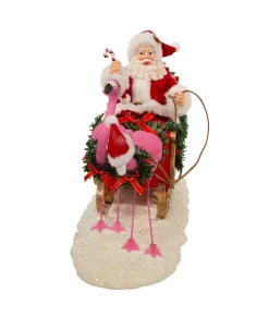 Père Noël Fabriché™ en traîneau avec flamants roses 10"